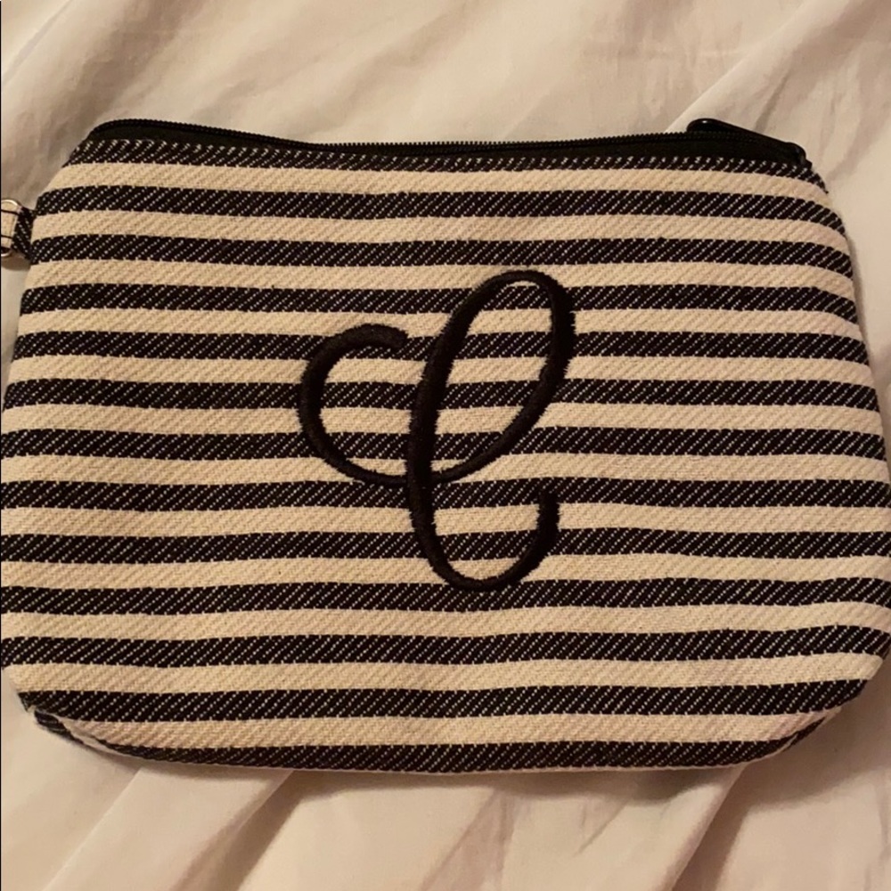 Black and Tan striped letter “c” makeup bag